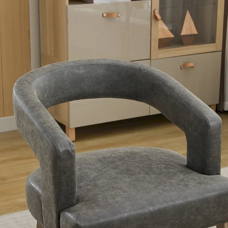 Fauteuil d'appoint moderne rembourré à dossier ouvert de 25,79 po de large, de forme cylindrique.