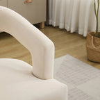 Fauteuil d'appoint moderne rembourré à dossier ouvert de 25,79 po de large, de forme cylindrique.