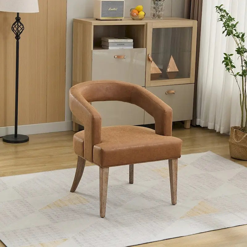 Fauteuil d'appoint moderne rembourré à dossier ouvert de 25,79 po de large, de forme cylindrique.