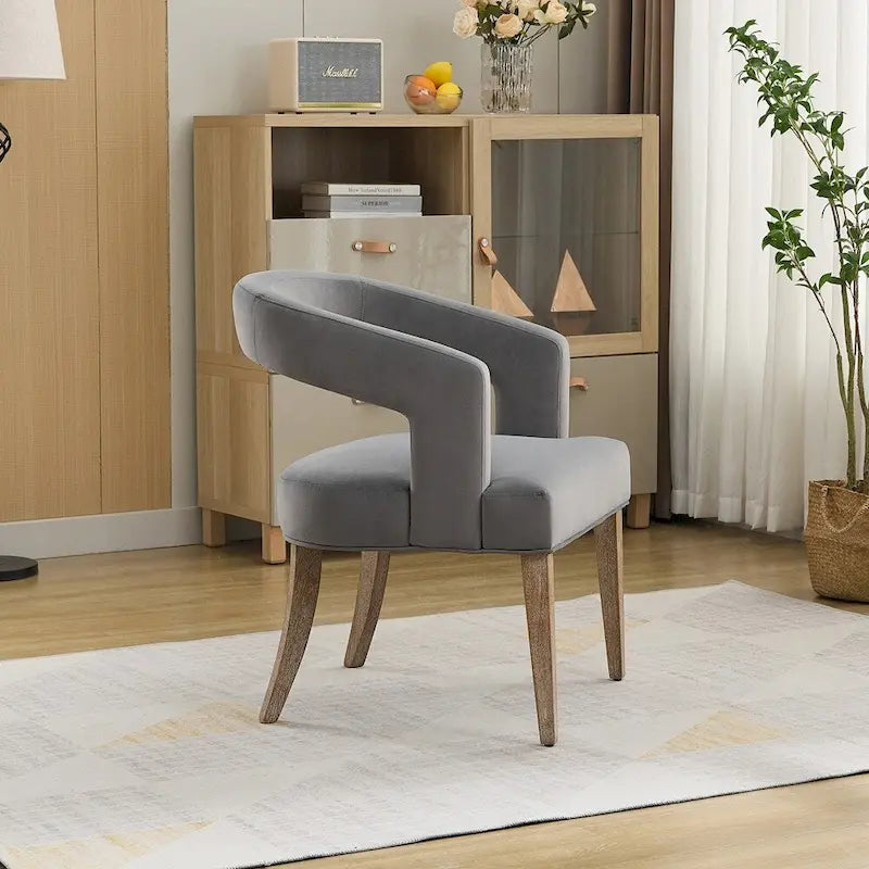 Fauteuil d'appoint moderne rembourré à dossier ouvert de 25,79 po de large, de forme cylindrique.
