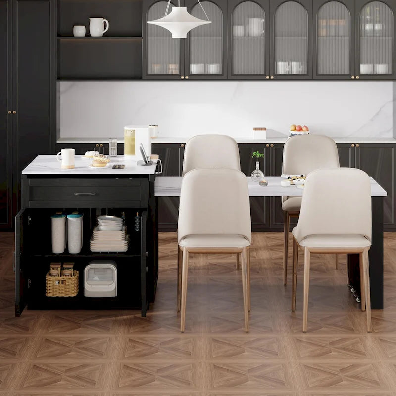 Îlot de cuisine en faux marbre avec table à manger extensible, prise électrique, rangements : 2 tiroirs et 2 étagères latérales ouvertes.