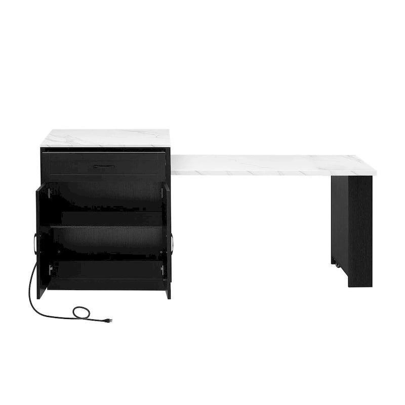 Îlot de cuisine en faux marbre avec table à manger extensible, prise électrique, rangements : 2 tiroirs et 2 étagères latérales ouvertes.