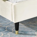 Lit plateforme beige style king size avec tête de lit en velours à oreilles