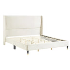 Lit plateforme beige style king size avec tête de lit en velours à oreilles