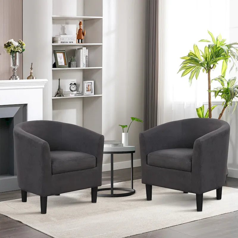 Fauteuil d'appoint classique en forme de tonneau, revêtu d'un tissu polyester doux, avec repose-pieds inclus.