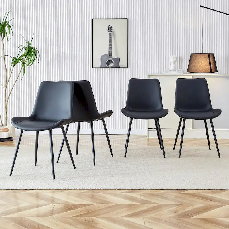 Ensemble de 4 chaises de restaurant rembourrées avec dossiers en daim et pieds en métal noir, convenant aux cuisines, salons et maisons de campagne.