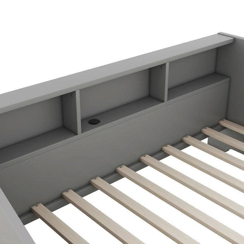 Cadre de lit de jour convertible en lit king size avec bibliothèque de rangement, deux tiroirs et système de recharge.
