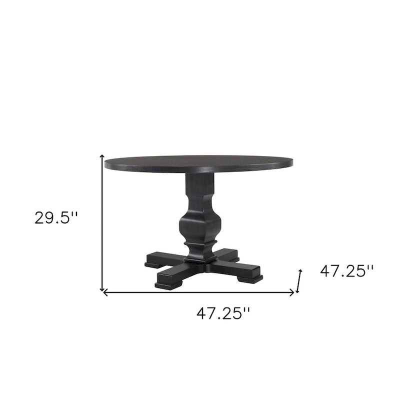 Table de salle à manger HomeRoots 47 avec pied central arrondi en bois massif noir